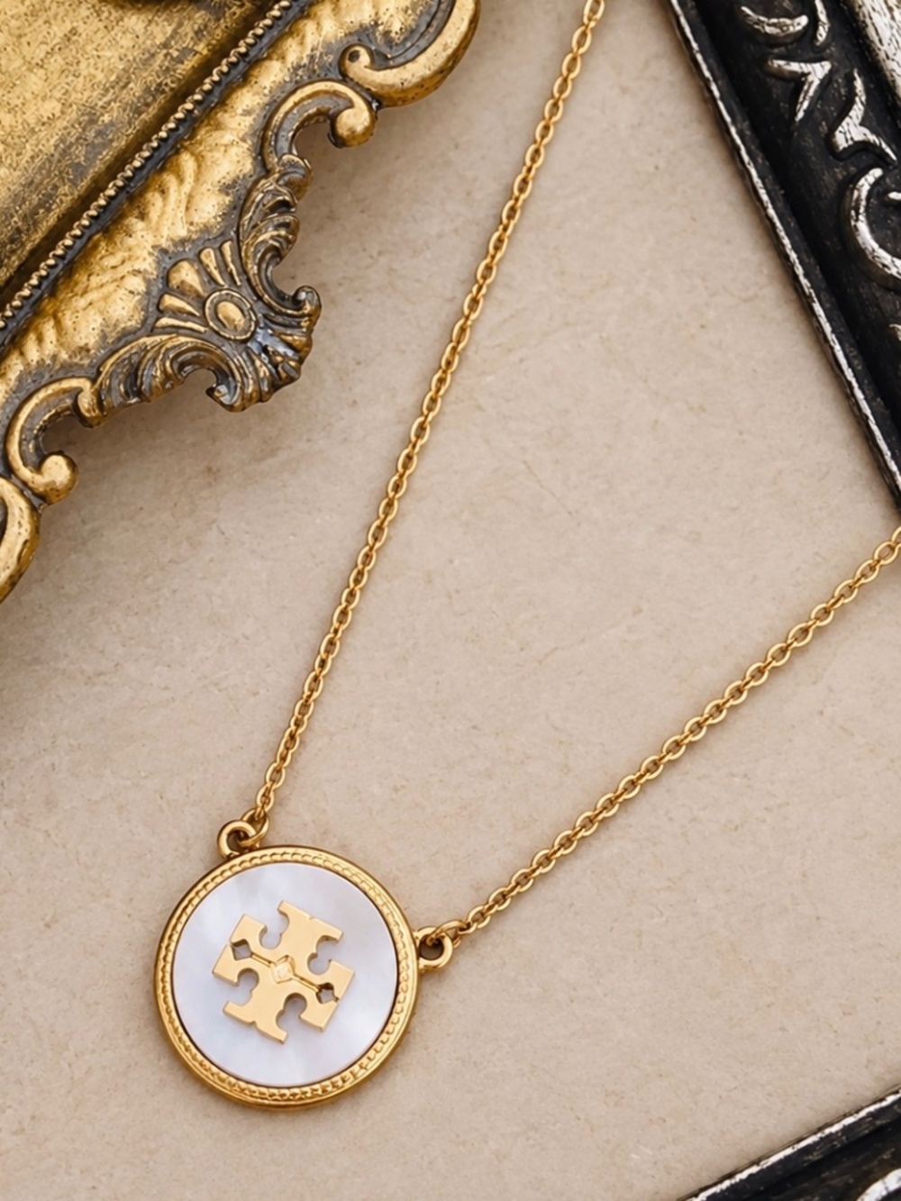 TORY BURCH • Semiprecious Mother Of Pearl Stone Pendant Logo Necklace